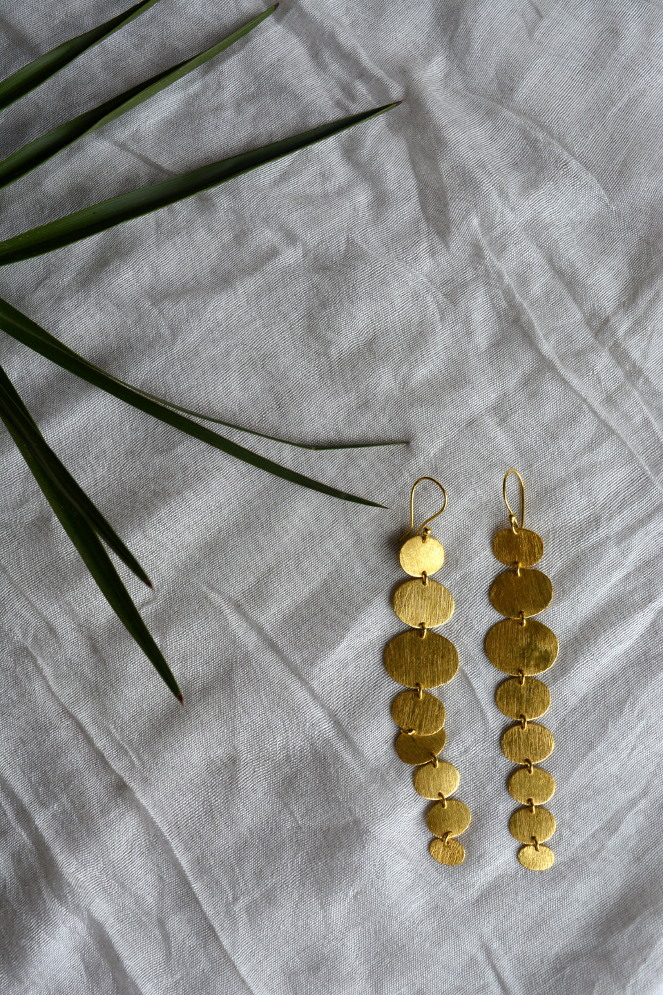 LocalLane Cascading Charm Handmade Brass Earrings